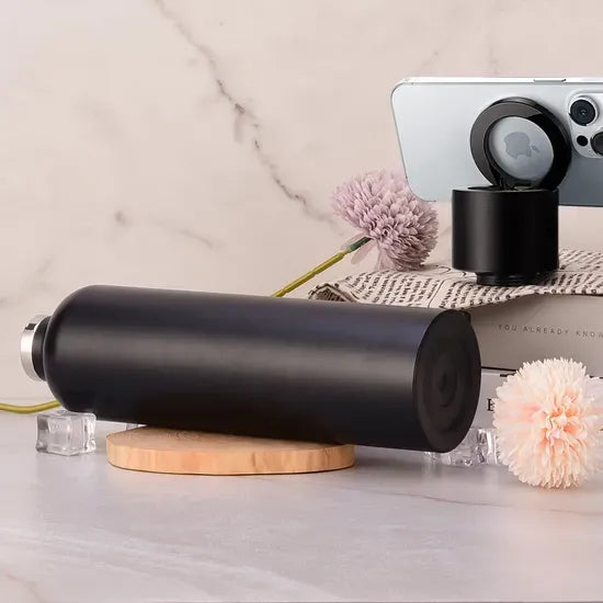 White vacuum insulated water bottle with magnetic phone holder